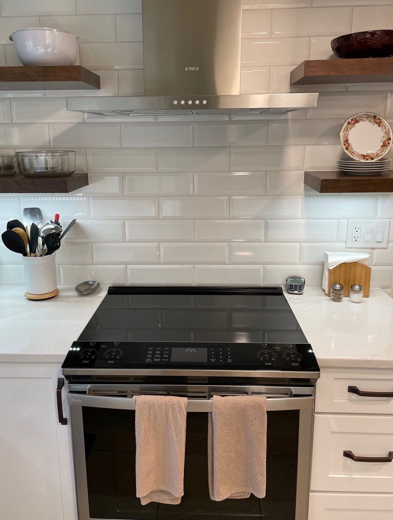 A remodeled bathroom with custom tile work by Brett's Kitchen & Bath